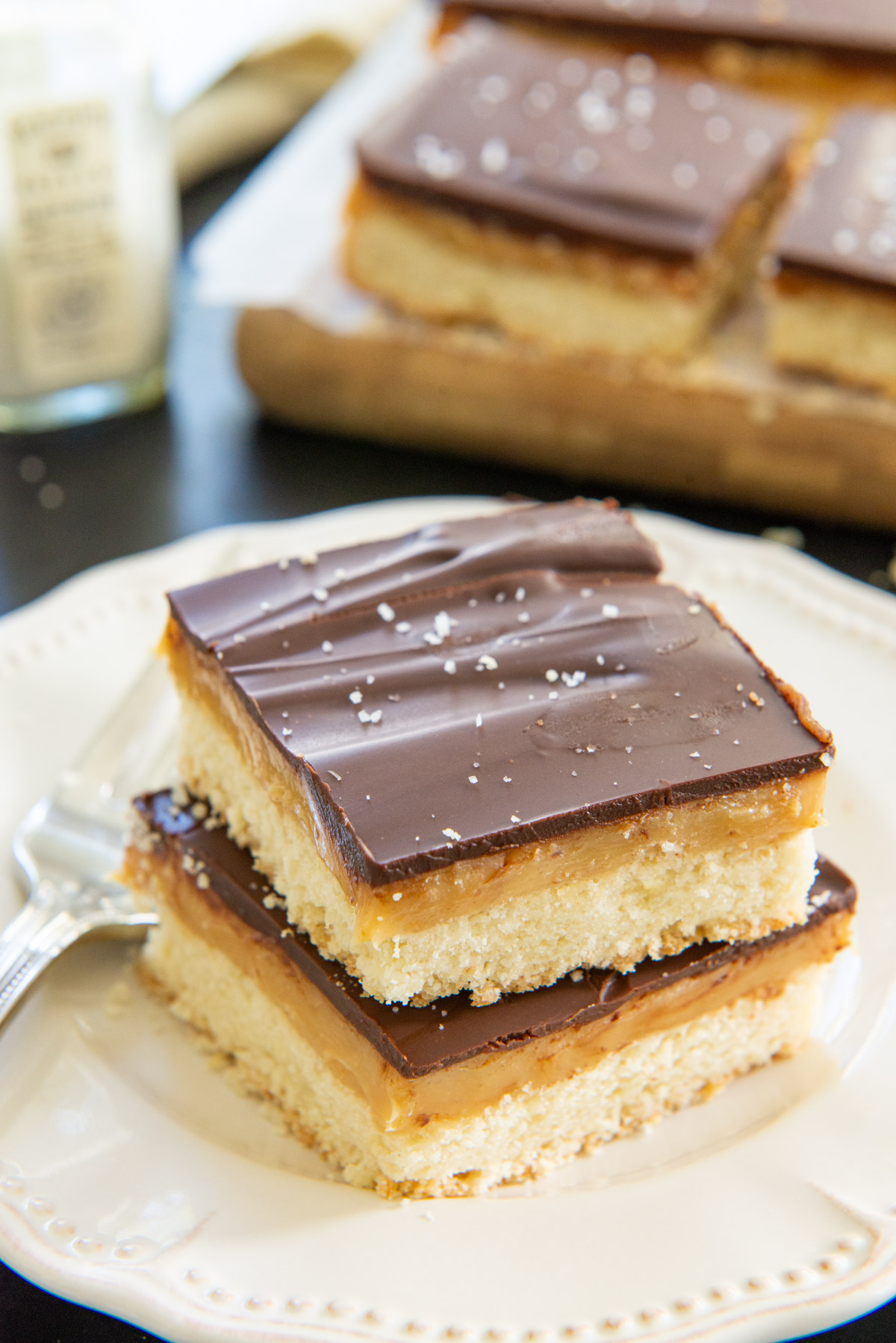 Millionaire's Shortbread Cut and Stacked on a Plate with Sea Salt