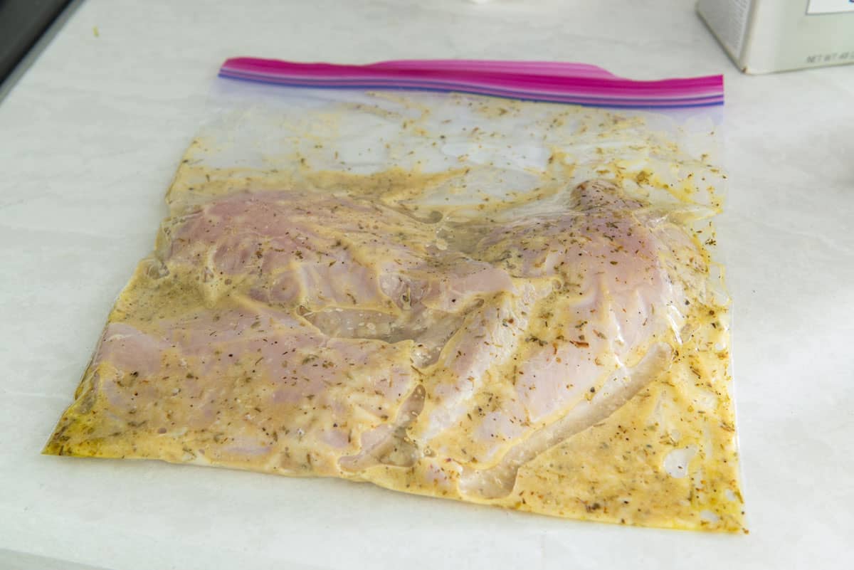 Raw Chicken Breasts in Plastic Bag with Marinade