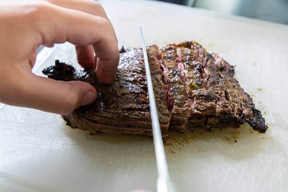 Slicing Skirt Steak across the grain into slices