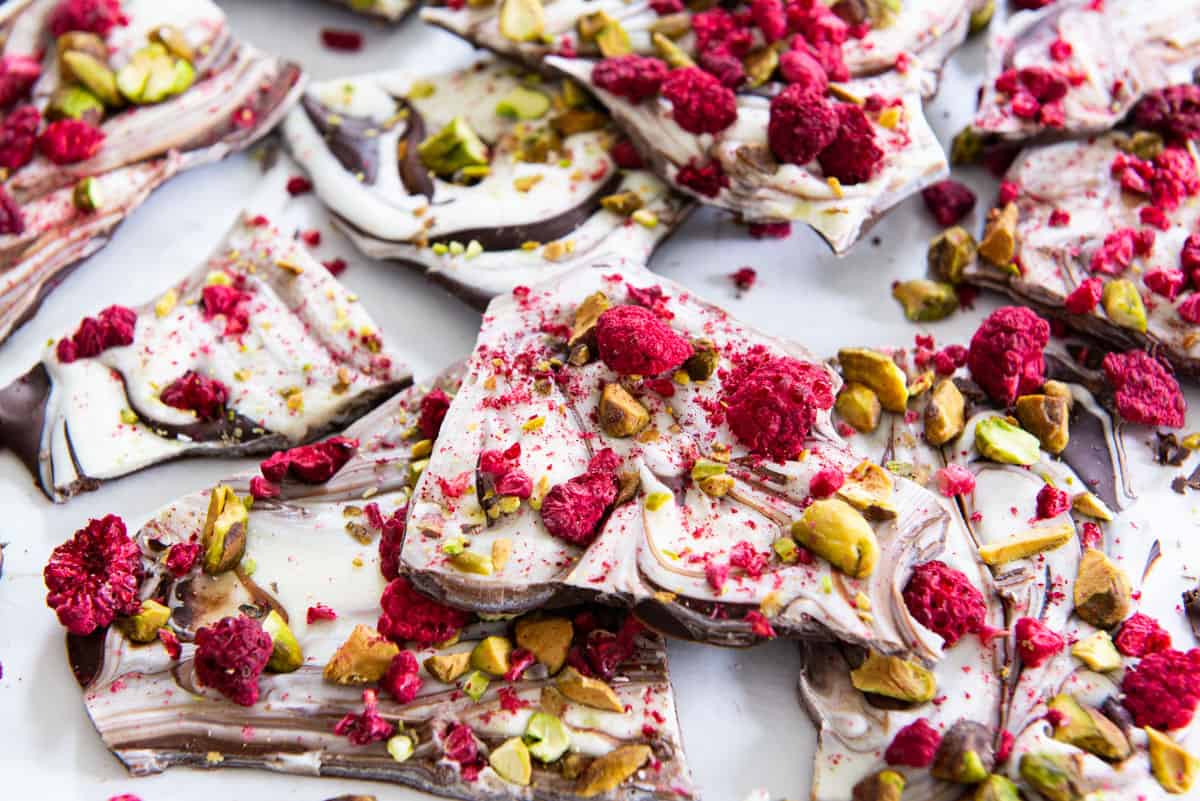 Chocolate Bark with Raspberries and Pistachios On Parchment Paper