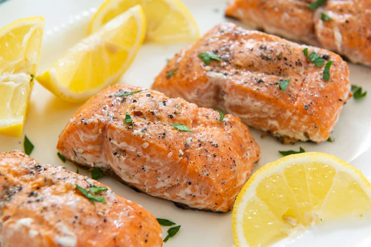 Grilled Salmon Recipe On a Plate with Lemon Wedges