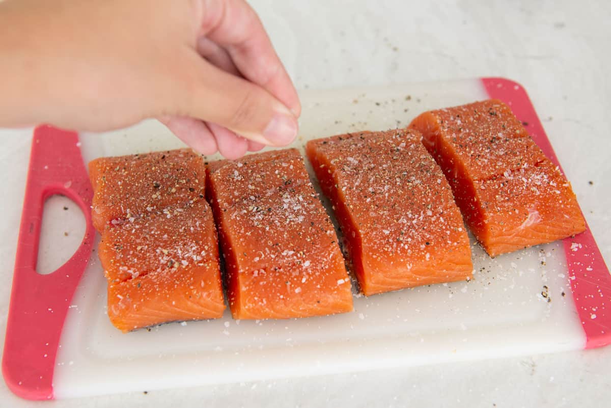 Seasoning the King Salmon Fillets with Salt and Pepper