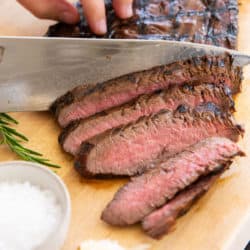 Sliced Grilled Flank Steak on Wooden Board