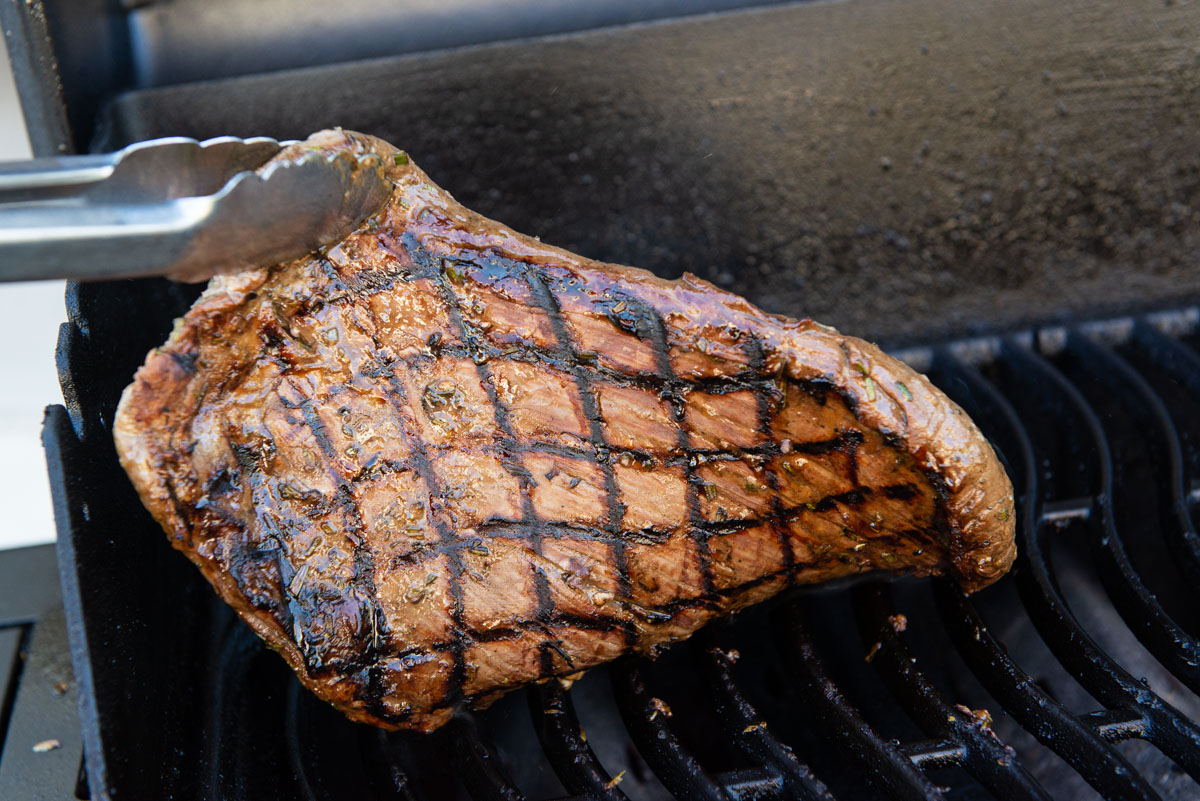 Showing the caramelization and grill marks underneath