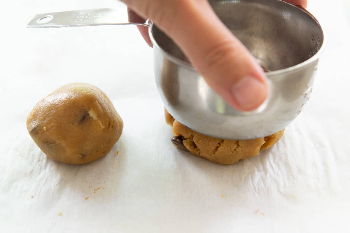 Flattening a Potato Chip Cookie Dough Ball with Measuring Cup