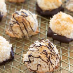 Coconut Macaroons On Wire Rack With Chocolate Drizzle
