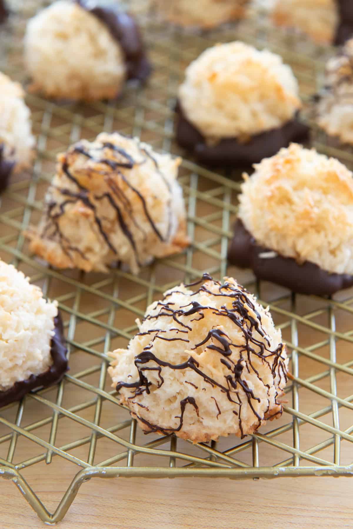 Coconut Macaroons On Wire Rack With Chocolate Drizzle