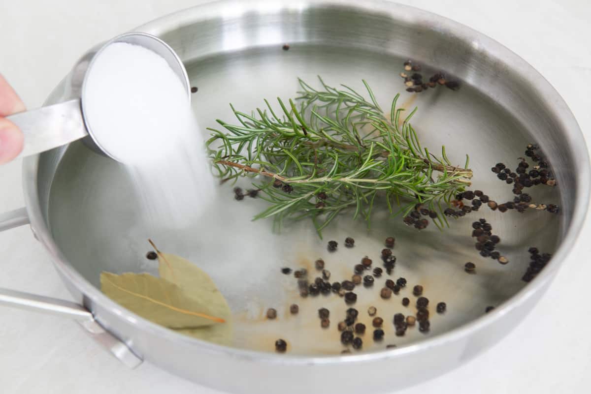 Making the Brine with Salt, Water, Rosemary, Bay Leaves, and Pepper