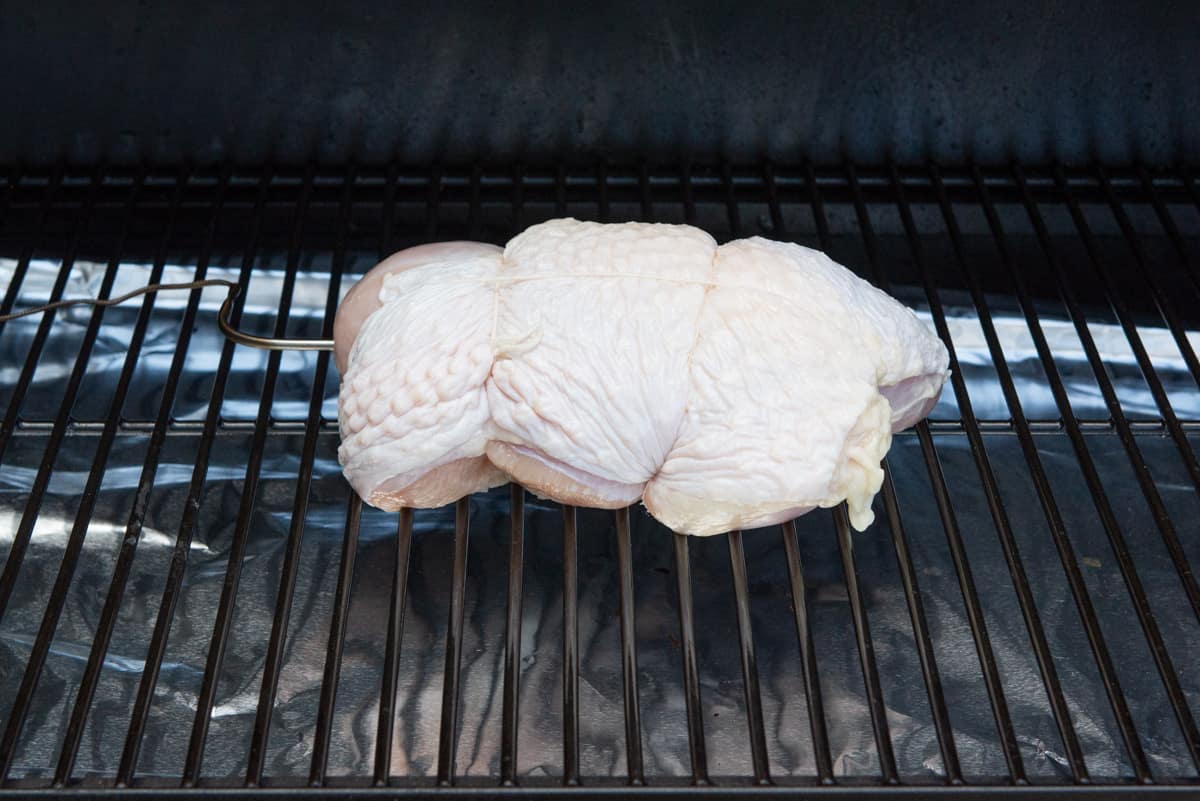 Brined Turkey Breast On Traeger Grill Grate With Probe