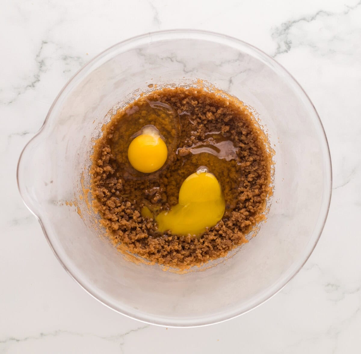 eggs mixed in with creamed sugar