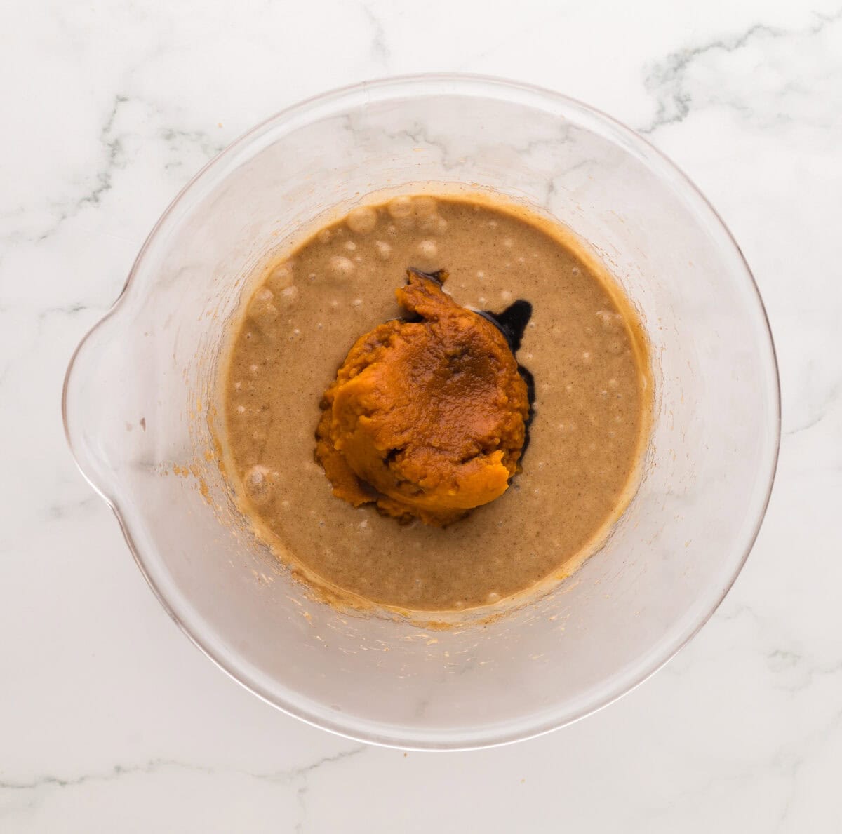 pumpkin puree in creamed mixture