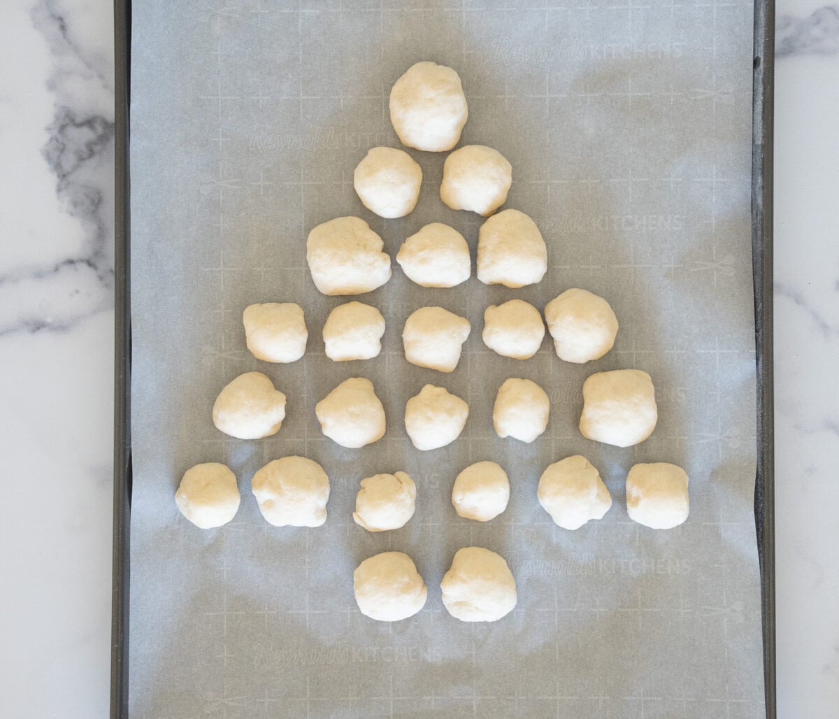 bread balls formed into christmas tree shape
