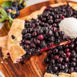Blueberry Galette on plate topped with Vanilla Icecream