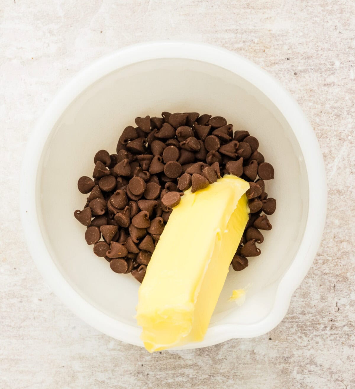 Butter and chocolate chips in bowl